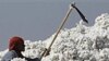 Indian laborer at cotton mill in Dhrangadhra, about 110 kilometers from Ahmadabad, India, Dec. 11, 2011.