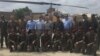 Members of a U.S. congressional delegation, headed by Republican Senator John McCain, pose for a picture with Dragon helicopter pilots from the Pakistani Air Force in Miramshah, North Waziristan, Pakistan, July 3, 2016. (@SenJohnMcCain)