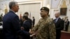 FILE - A member of U.S. delegation (L) shakes hand with a member of Pakistani delegation before a meeting in Kabul, Afghanistan, January 18, 2016. Pakistani officials are particularly furious at a Congressional hearing last week in Washington under the title “Pakistan: Friend or foe.”