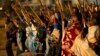 Miners on strike chant slogans as they march in Nkaneng township outside the Lonmin mine in Rustenburg May 14, 2014. 