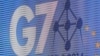 Українські експерти: Замість запрошувати до “Великої сімки”, Путіна треба судити в Гаазі