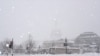 The US Capitol hardly visible in the background, in the middle of a snowstorm, Washington DC, 06 Feb 2010