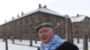 FILE - Former prisoner Stanislaw Zalewski attends the 74th anniversary of the liberation of former German Nazi death camp Auschwitz-Birkenau, in Oswiecim, Poland, on Jan. 27, 2019. He'll return for the 75th anniversary on Monday.