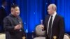 Russian President Vladimir Putin, right, toasts with North Korea's leader Kim Jong Un after their talks in Vladivostok, Russia, April 25, 2019. 