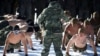 FILE - South Korean and U.S. Marines take part in a winter military drill in Pyeongchang, South Korea, Dec. 19, 2017. 