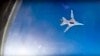 FILE - In this frame grab from video provided by Russian Defence Ministry press service, Russian long-range bomber Tu-22M3 flies during an airstrike over Aleppo region of Syria, Aug. 16, 2016. 