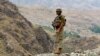 FILE - A Pakistan army soldier stands guard in the Pakistani tribal area of Khyber near the Torkham border post between Pakistan and Afghanistan, June 15, 2016.