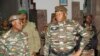 FILE - Jenderal Abdourahmane Tiani, yang diumumkan sebagai kepala negara baru Niger oleh para pemimpin kudeta, tiba untuk bertemu dengan para menteri di Niamey, Niger 28 Juli 2023.