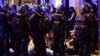 Fourth night of riots after teenager shot dead by police in Paris suburb