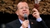 FILE - Martin Kobler, U.N. special envoy to the Democratic Republic of the Congo, addresses troops outside Goma, Aug. 31, 2013. 