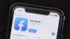FILE - The social media application, Facebook is displayed on Apple's App Store, July 30, 2019. 
