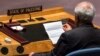 FILE - Palestinian U.N. Ambassador Riyad Mansour reads a statement from the President of the United Nations Security Council during a meeting at the U.N. headquarters in New York.