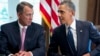 President Barack Obama talks with House Speaker John Boehner of Ohio, prior to speaking to media, in the Cabinet Room of the White House in Washington, Sept. 3, 2013.