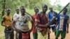 FILE - fighters from a Christian militia movement known as the "anti-balaka" display their makeshift weaponry in the village of Boubou, between the towns of Bossangoa and Bouca, Central African Republic.