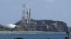H2-A launch vehicle number 47 is seen on the launching pad at Tanegashima Space Center on the southwestern island of Tanegashima, Japan in this photo taken by Kyodo on Aug. 28, 2023. Kyodo/via REUTERS 