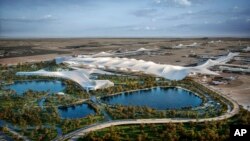 Gambar rencana pembangunan Bandara Internasional Al Maktoum Dubai dipamerkan di Dubai World Central,Dubai, Uni Emirat Arab. Pemerintah Dubai mengumumkan dimulainya pembangunan terminal bandara terbesar di dunia, Minggu, 28 April 2024. (Foto: Pemerintah Dubai via AP)