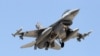 A Turkish F-16 fighter jet approaches the tarmac of Incirlik airbase in the southern Turkish city of Adana, July 4, 2012.