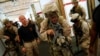 FILE - U.S. Marines work with instructors on a building-clearing drill in Chesapeake, Virginia, Sept. 25, 2012.