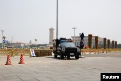A police vehicle is deployed in Tiananmen Square in Beijing, June 4, 2019.