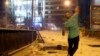 A supporter of deposed Egyptian President Mohamed Morsi throws stones at riot police during clashes in the Ramsis square area in central Cairo, July 15, 2013. 