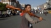 FILE - A Houthi Shiite rebel joins protests against Saudi-led airstrikes at a rally in Sana'a, Yemen, April 1, 2015. 