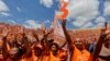 Para pendukung dari Presiden Madagaskar Andry Rajoelina, menghadiri kampanye di Antananarivo, pada 12 November 2023. (Foto: AP/Alexander Joe)