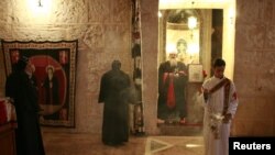 Syriac Christian monks attend a service in Mor Gabriel monastery in southeastern Turkey.