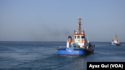 Security boats patrolling the Arabian Sea near Gwadar port.