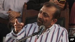 Farooq Sattar, leader of the Muttahida Qaumi Movement, or MQM, addresses a news conference in Karachi, Pakistan, Aug. 23, 2016.