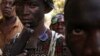 Anti-Balaka fighters pose at their base in the Boeing district of the Central African Republic's capital Bangui, Jan. 6, 2014.