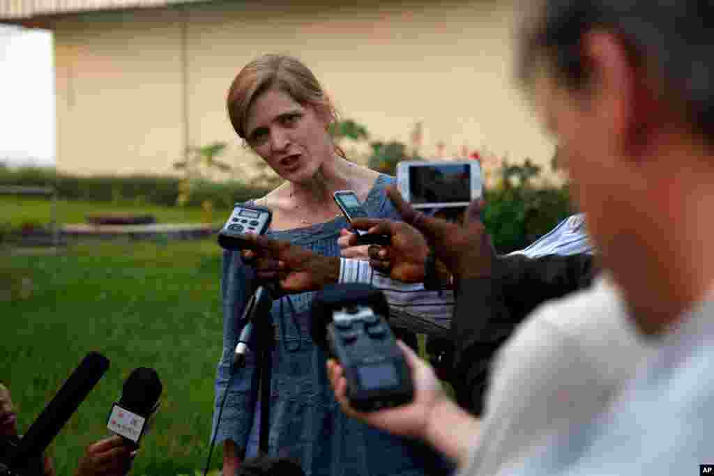 U.S. Ambassador to the United Nations Samantha Power answers questions at the airport in Bangui, Central African Republic, Dec. 19, 2013. 