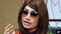 FILE - Pakistani fashion model Qandeel Baloch speaks during a press conference in Lahore, Pakistan, June 28, 2016.