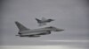 Ilustrasi - Dua jet Eurofighter Jerman mensimulasikan intersepsi sebuah pesawat di atas laut Baltik 1 November 2018. (REUTERS/Sabine Siebold)