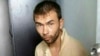 This image released by the Royal Thai Police shows a man who was arrested at an apartment on Aug. 29, 2015, in Bangkok, Thailand, along with evidence police said included bomb-making equipment.