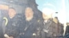 WikiLeaks founder Julian Assange (C) leaves the Westminster Magistrates Court in a police van, after he was arrested in London, Britain, April 11, 2019. 