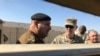 U.S. Army Lt. Gen. Stephen Townsend (center right) speaks with an Iraqi officer during a visit to an area north of Baghdad, Feb. 8, 2017. 