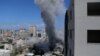 Smoke rises after an Israeli missile strike in Gaza City, July 18, 2014.