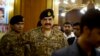 FILE - Pakistan's army chief, General Raheel Sharif, is seen arriving at a seminar in Gwadar, Pakistan, April 12, 2016. He said Tuesday that recent army-led security operations near the Afghan border had uprooted terrorist infrastructures.