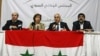 From left, Ahmed Ramadan, Bassma Kodmani, Abdulbaset Sieda and Imad Aldeen Rashid speak as a group of Syrian opposition members announced a Syrian National Council in Istanbul, Turkey (September 15, 2011).