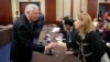 House Minority Whip Steny Hoyer of Maryland, left, greets Farah Al Khafaji, a former Iraqi interpreter for the U.S. military, on Capitol Hill in Washington before a House Democratic forum on President Donald Trump's executive order on immigration, Feb. 2, 2017.