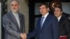 Iranian Foreign Minister Ali Akbar Salehi (L) and his Turkish counterpart Ahmet Davutoglu are seen before a meeting in Ankara, Turkey, August 7, 2012.