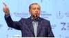 Turkey's President Recep Tayyip Erdogan, gestures as he delivers a speech at a conference in Istanbul, April 29, 2017. 