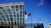 FILE - A security guard stands outside the U.S. Embassy in Havana, Cuba, Dec. 12, 2017.