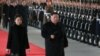 Foto Achiv: Lide Kore di No, Kim Jong Un ak Madanm ni. 