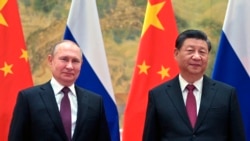 ប្រធានាធិបតី​រុស្ស៊ី លោក Vladimir Putin (ឆ្វេង) និង​ប្រធានាធិបតី​ចិន លោក Xi Jin Ping។​