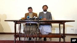 FILE - Officials of the Hezb-i-Islami faction speak during a press conference in Kabul, Afghanistan, March 17, 2016.
