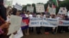 Cambodian-Americans have gathered in front of the White House in Washington, DC, July 12, 2013, to demand reforms to the Cambodian National Election Committee ahead of July 28 parliamentary elections. (VOA Khmer)