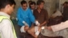 A Pakistani child who was injured in a suicide bombing is treated at a local hospital in Khar, Pakistan, Friday, Sept. 16, 2016. A suicide bomber attacked a Sunni mosque in northwest Pakistan on Friday, killing dozens of worshippers.