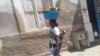 Mulher zungueira no Namibe (Foto de Arquivo)