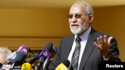 FILE - The supreme guide of Egypt's Muslim Brotherhood Dr. Mohamed Badie speaks during a news conference at the Brotherhood's main office in Cairo, Dec. 8, 2012. 